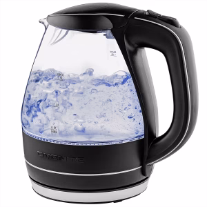 Ovente glass electric kettle with blue LED light and auto shut-off feature on countertop, budget-friendly design